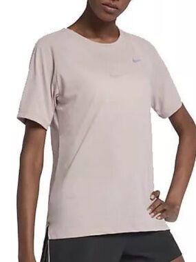 Nike Women's Dri-FIT running top in a dusty pink color